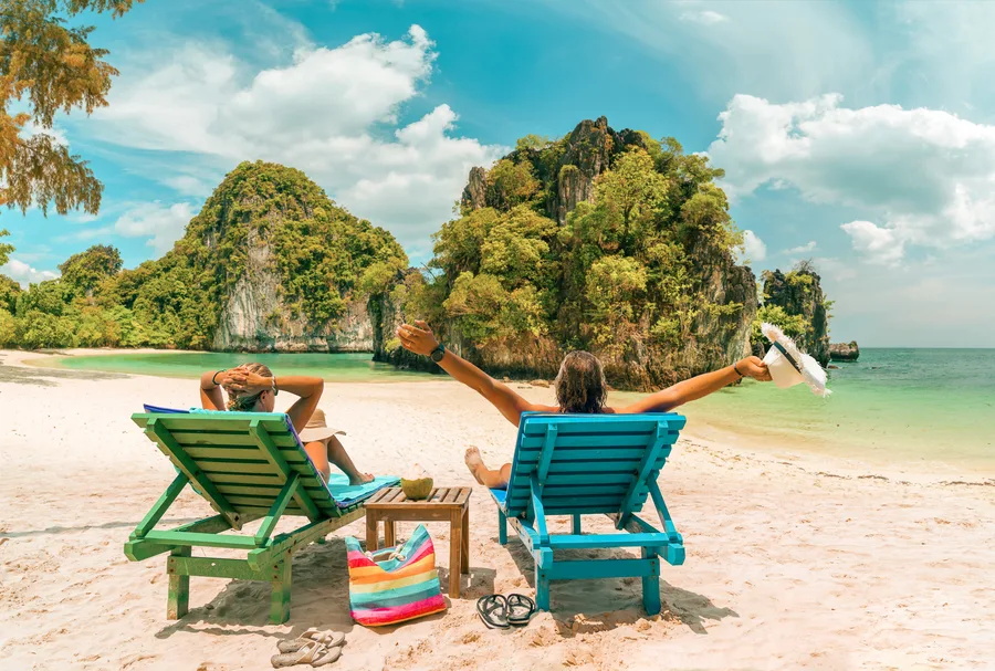 Couple walking at a tropical resort